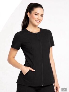 JAANUU Women’s Zip Pocket Moto Top in Black - M